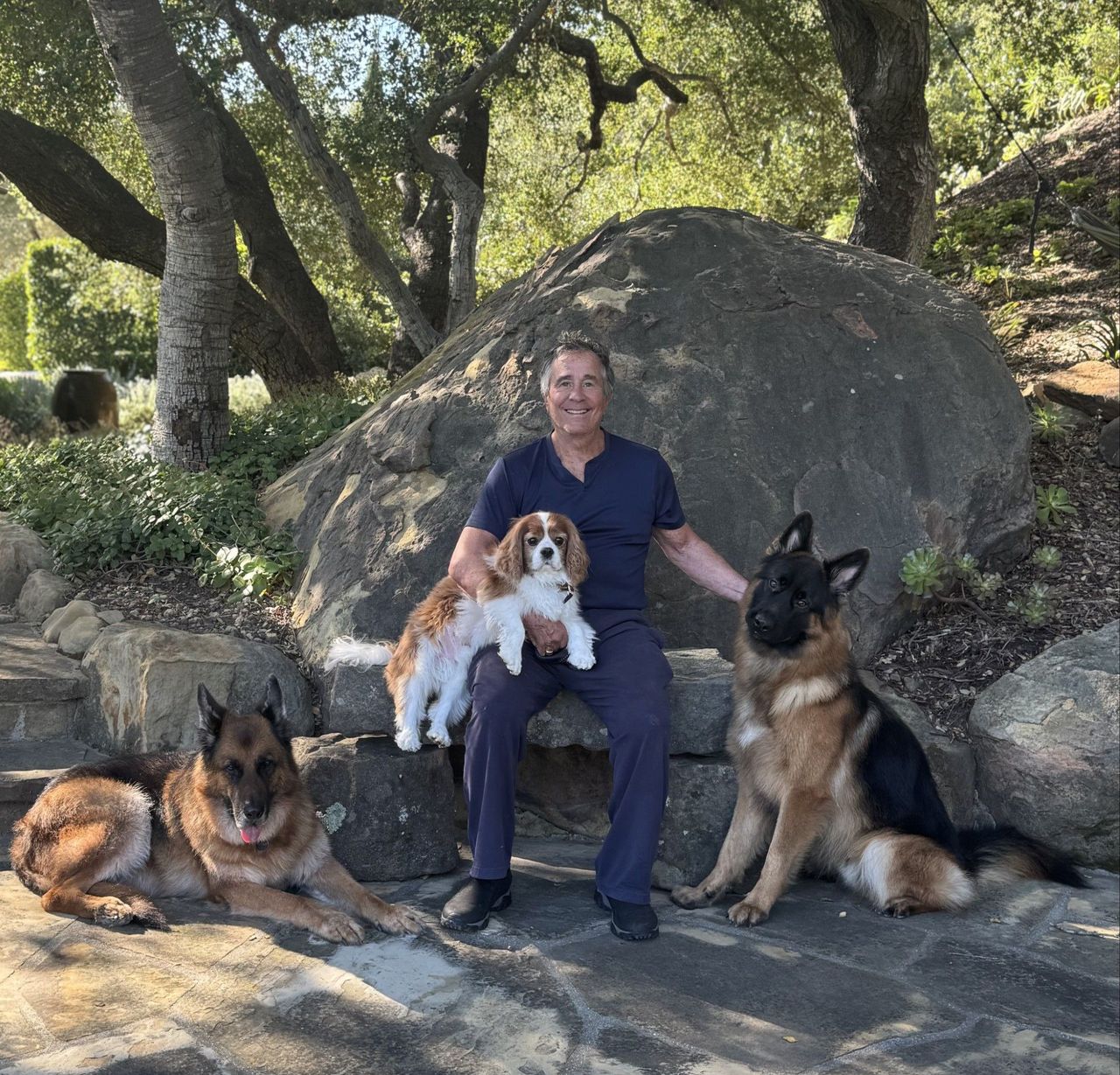 Thomas S. Perakos with his dogs